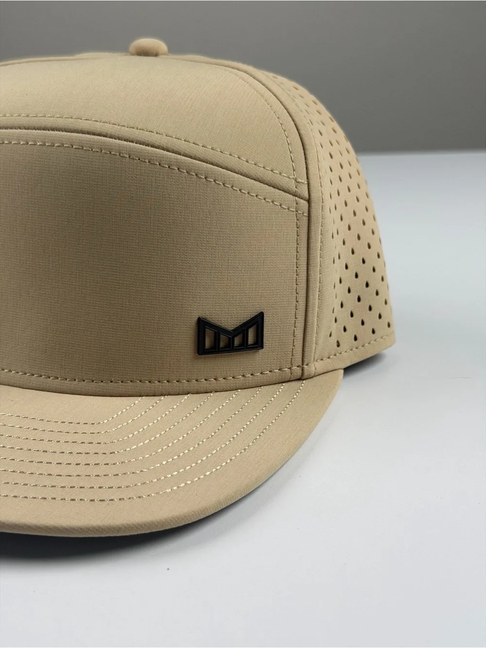 Melin Trenches Icon Hydro Performance Snapback Hat in Khaki, Classic